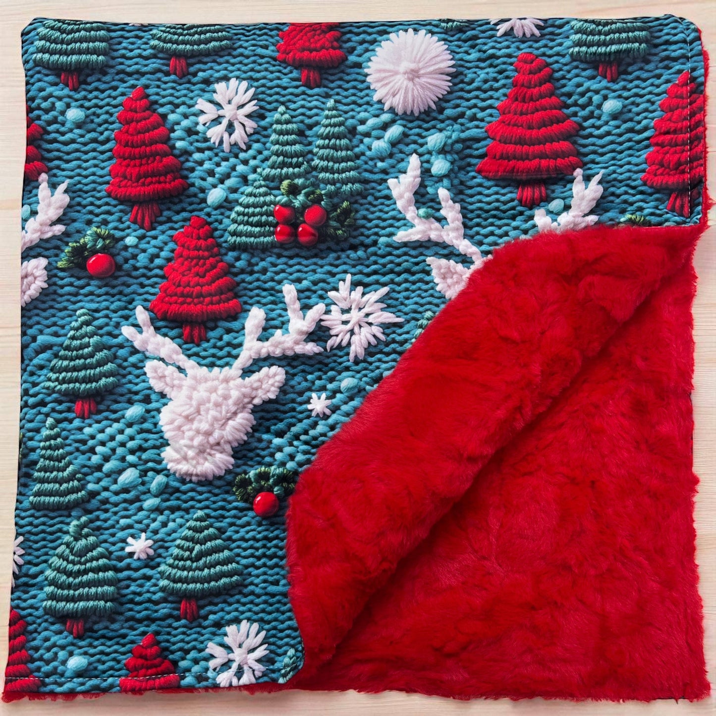 Red nose reindeer on green Christmas baby blanket. (Copy)
